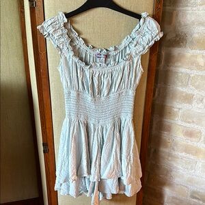 Urban Outfitters women’s size small smocked tiered light blue romper.